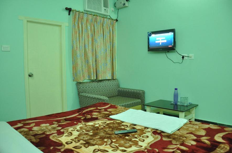 Hotel Kiran Palace Varanasi Quarto foto
